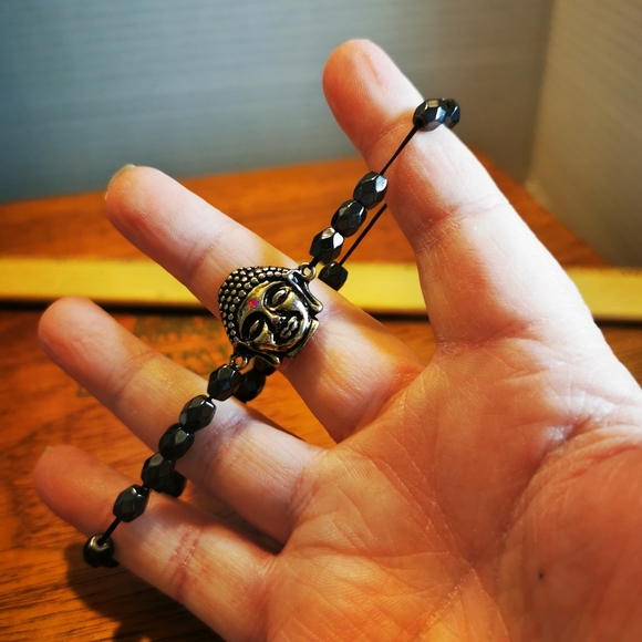 Stretch Faceted Hematite and Brushed Silver Tone Buddha Bracelet - Picture 4 of 12